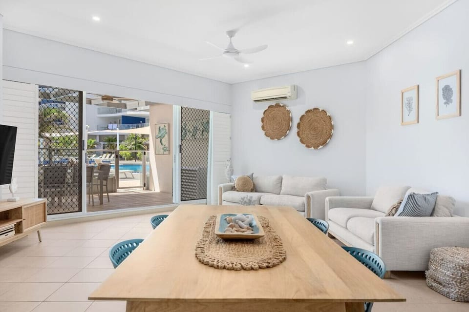 View of the kitchen and open-plan dining/living area.