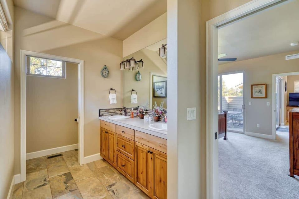 The spacious and well-appointed ensuite bathroom, seamlessly connected to the primary bedroom for your comfort and ease.