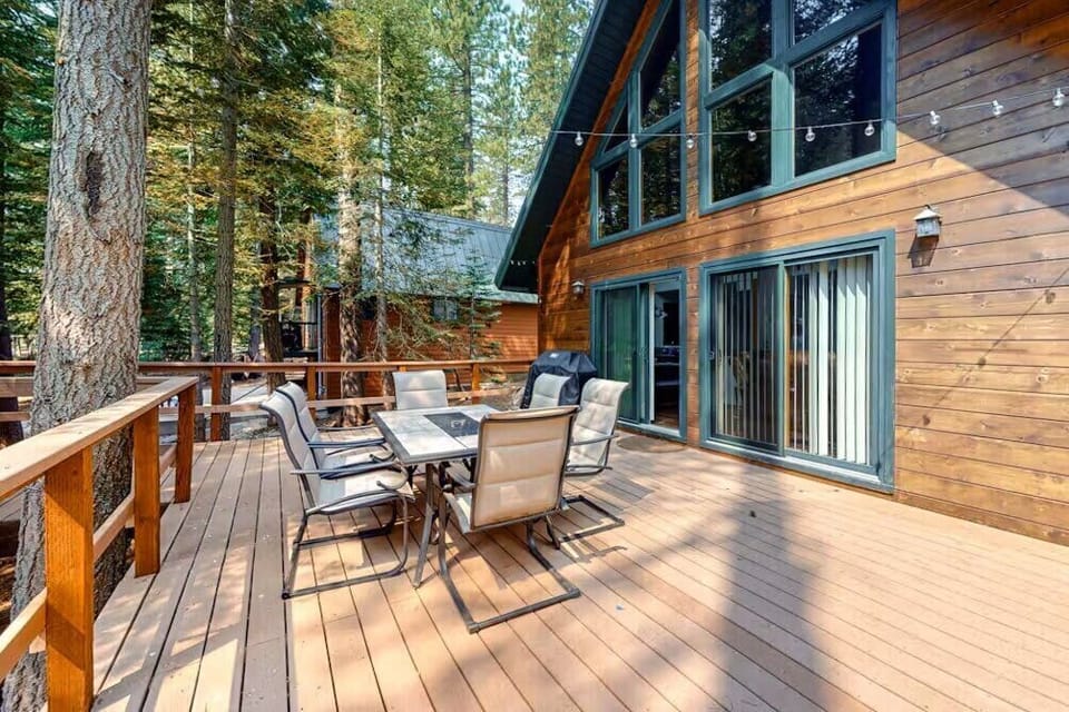 The spacious deck is the perfect space to enjoy meals outside, take in the sunshine, or enjoy late-night chats under the outdoor lighting.