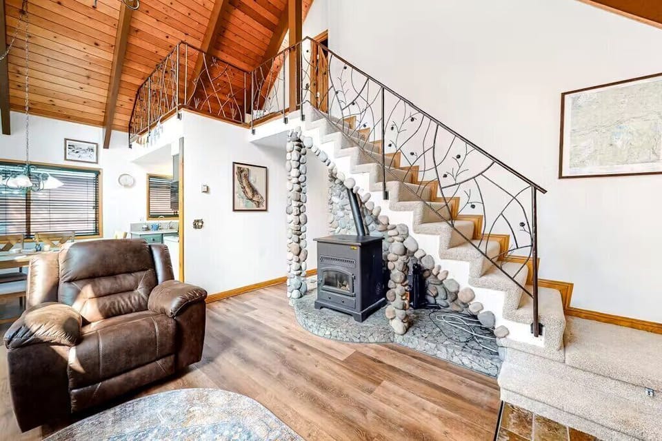 The main living space features the living room, dining, and kitchen offering the perfect space for your group to relax and connect.