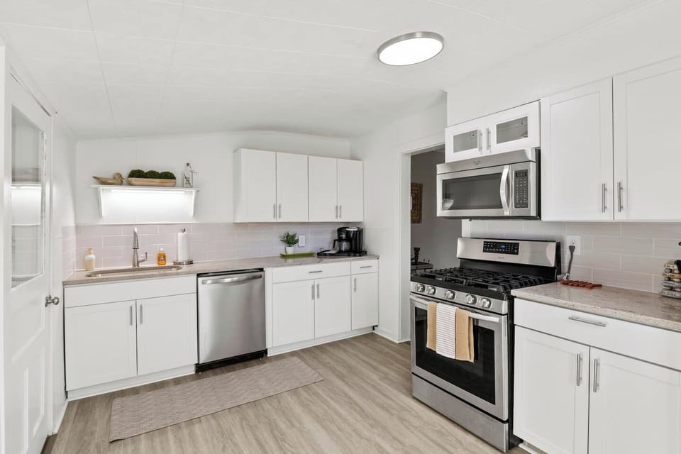Savor the simplicity of our fully-equipped kitchen with sleek, stainless steel appliances and a fresh, clean design.