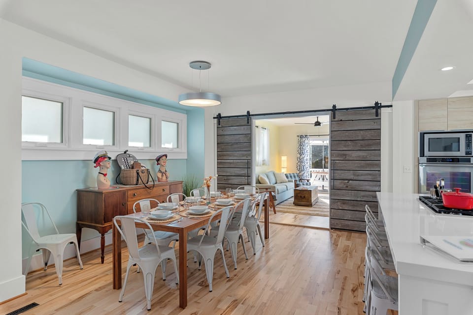 Large modern farmhouse dining table designed for gathering everyone together.