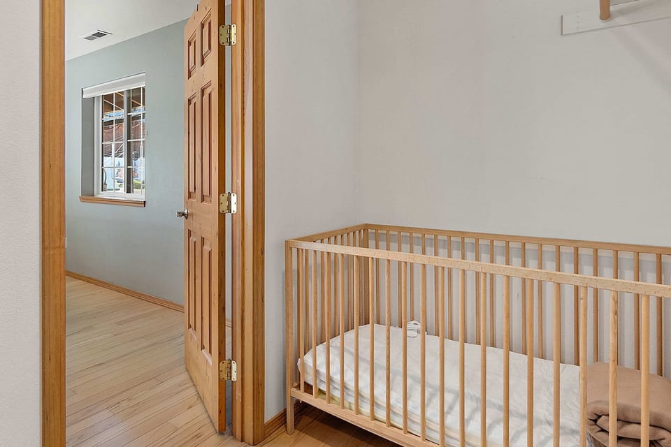 Crib room no longer has a door, and is just off the queen room.