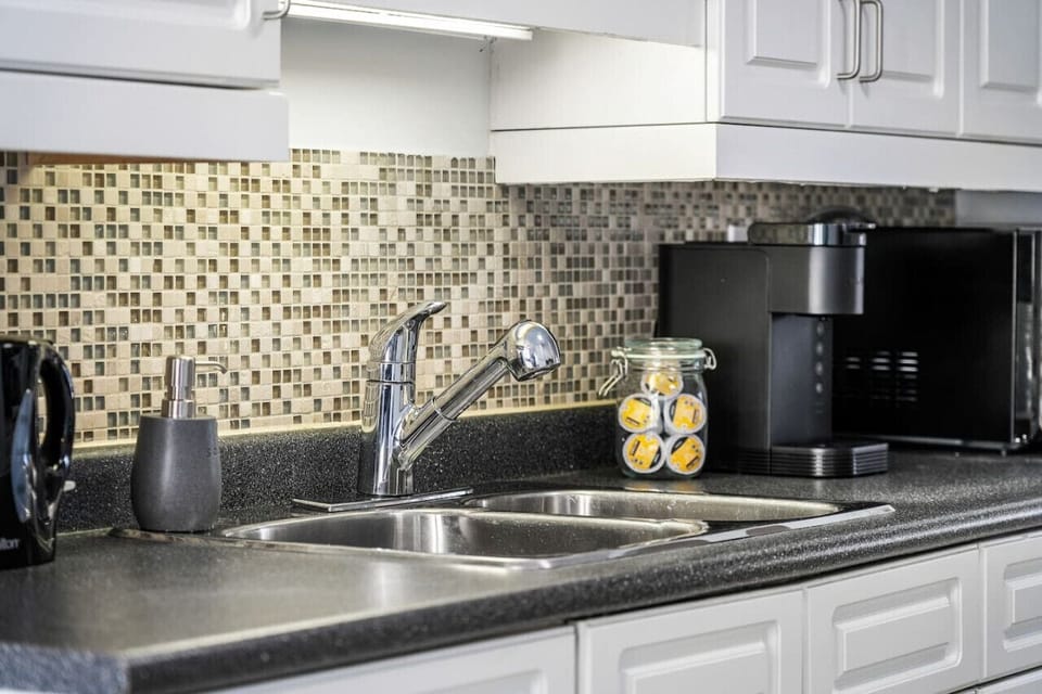 Complimentary coffee pods, tea bags and water. Eletric kettle is available to heat water!