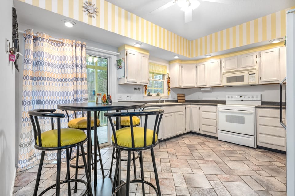 Kitchen with full cooking amenities.