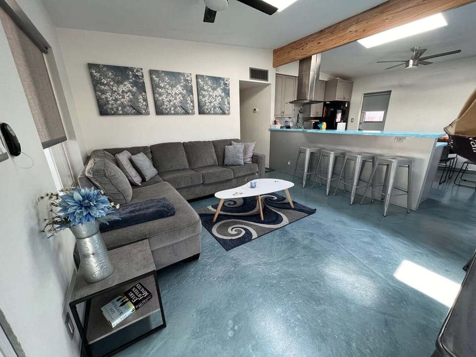 The front room and breakfast bar! Read a book or visit with friends!
