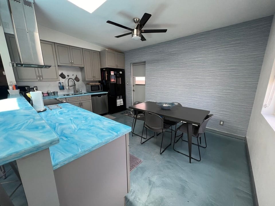 Dine-in kitchen + plus breakfast bar provides seating for 8.