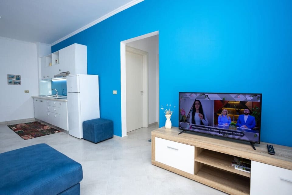 Living room and the fully-equipped kitchen