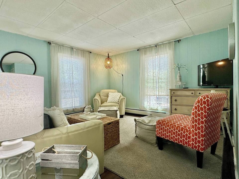 Comfort for everyone! The living area features its own dedicated A/C unit, keeping the entire cottage—including the new sleeper sofa area—crisp and cool for all 4 guests.