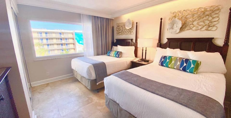 Unit with 2 Double size beds. Exact unit will be assigned upon arrival. Views, colors and decor may vary.