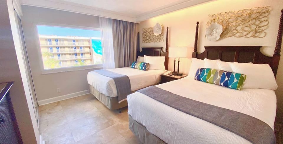 Unit with 2 Double size beds. Exact unit will be assigned upon arrival. Views, colors and decor may vary.