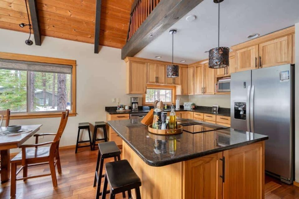 Whip up delicious meals in this well-appointed kitchen. Cascadia Getaways provides all you need for a seamless stay! 