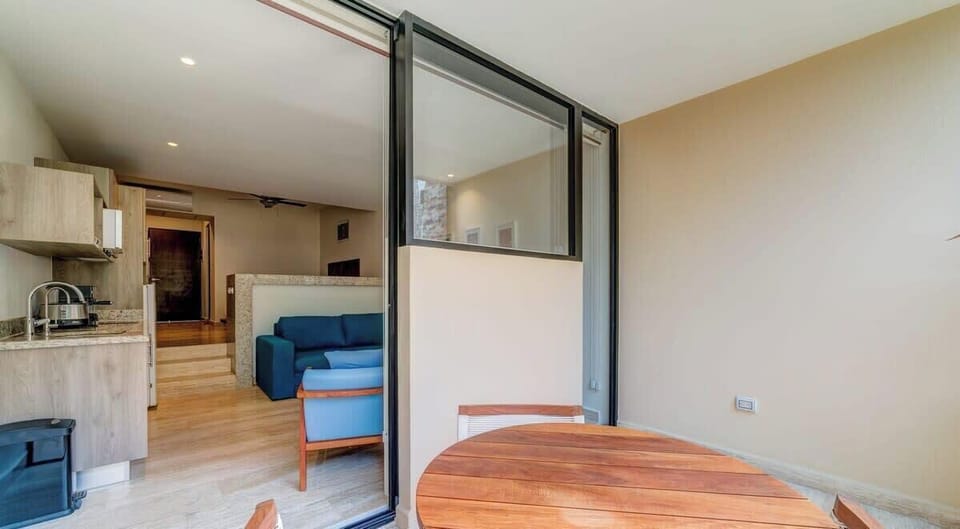Open these doors to extend the space to the private balcony