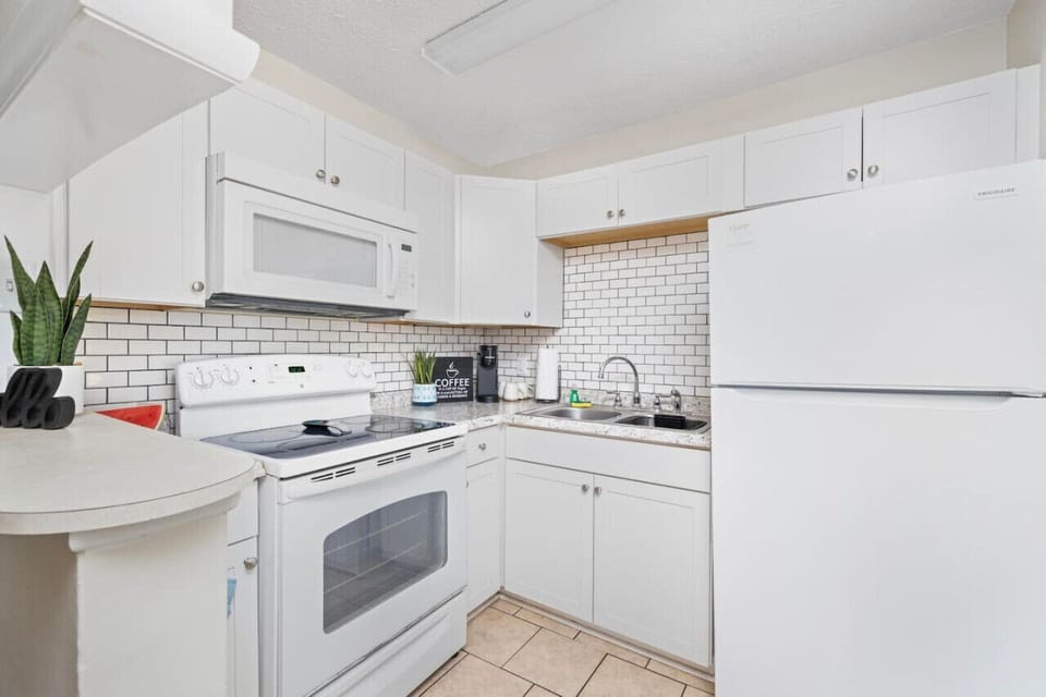 This charming kitchen is designed for convenience, whether you’re prepping snacks or full meals.