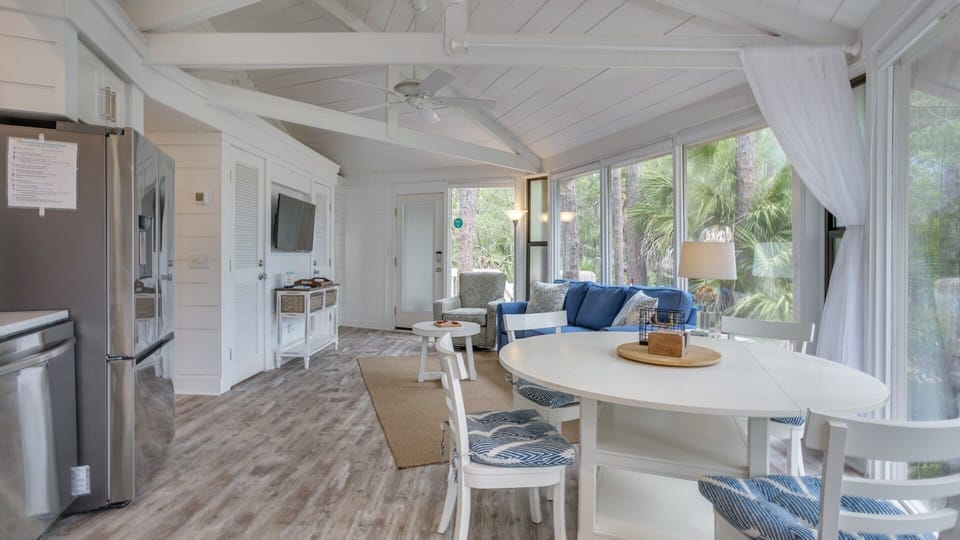 The layout includes a cozy seating area, a dining nook with room for family meals, and seamless flow into the updated kitchen.