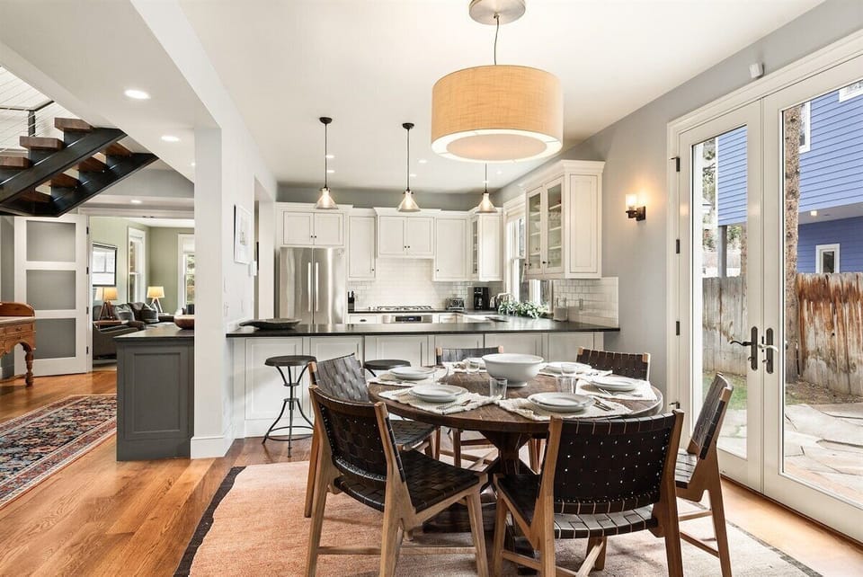 Cozy dining area cushioned between the kitchen and living room