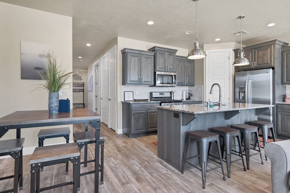 Kitchen - The Kitchen Island comfortably seats 4 adults and creates a great space for serving and preparing meals.