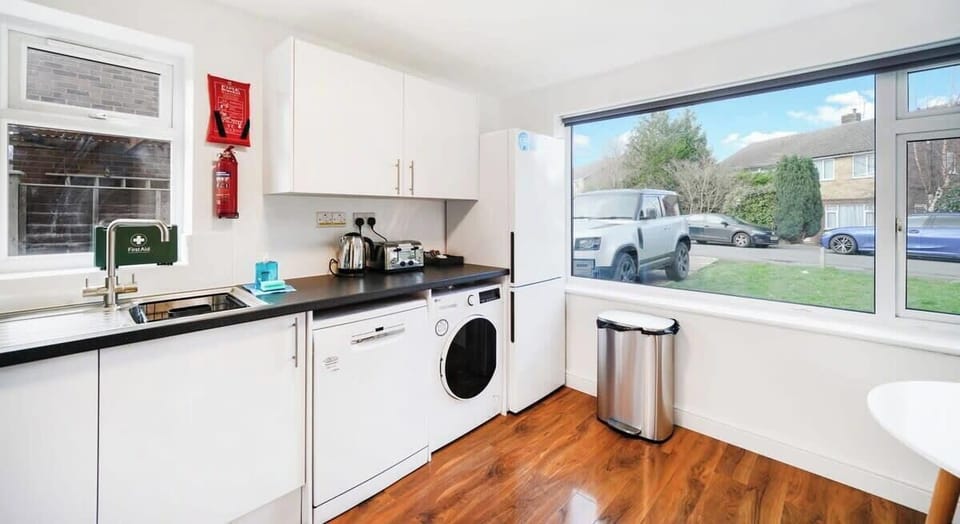 FULLY EQUIPPED KITCHEN AND WASHER