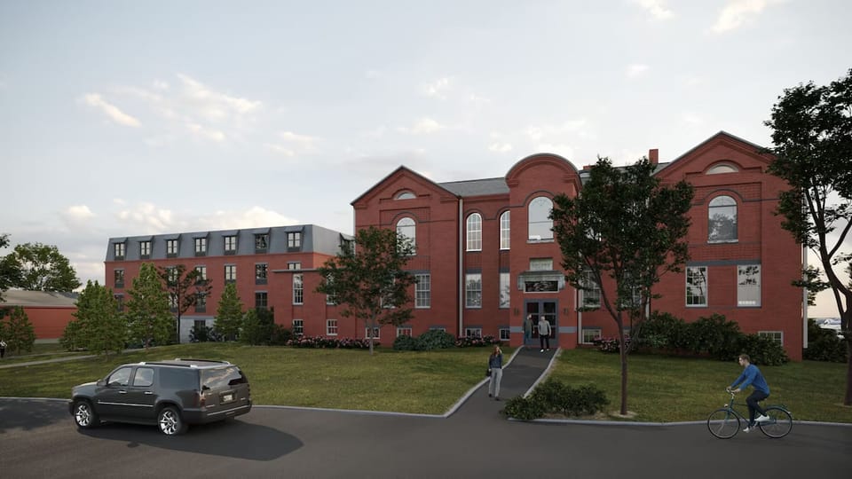 Arrive to a charming brick façade with easy access.