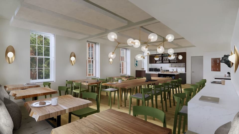 Gather beneath modern lighting for bright, airy dining.