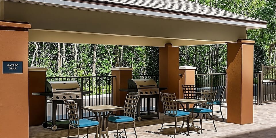 Gather for easy evenings with grills, seating, and open-air shade.