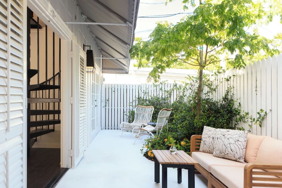 Sip morning coffee in the serene, sunlit private courtyard.