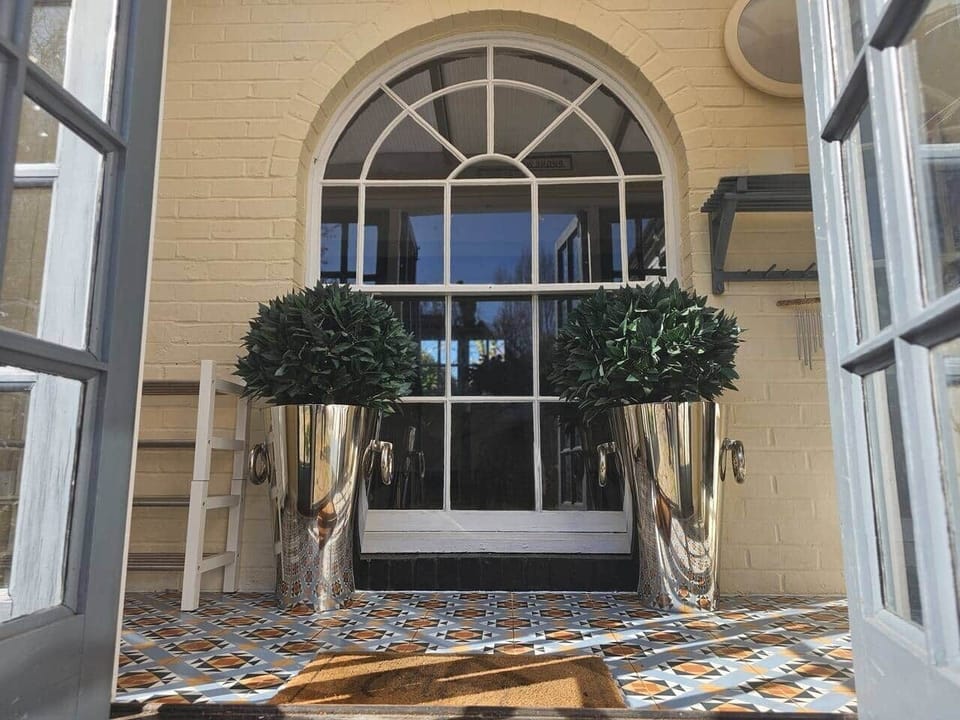 Entrance porch with lots of space for shoes and coats