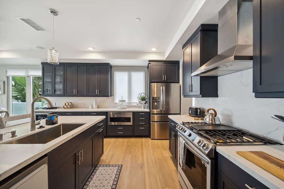 The fully-equipped kitchen features high-quality appliances