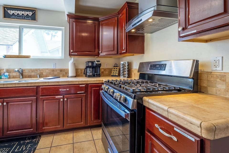Cook up a feast in a stylish kitchen with modern appliances and bright views.
