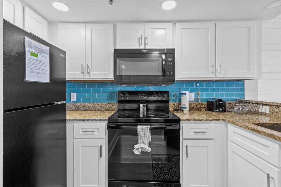 Full kitchen with granite countertops