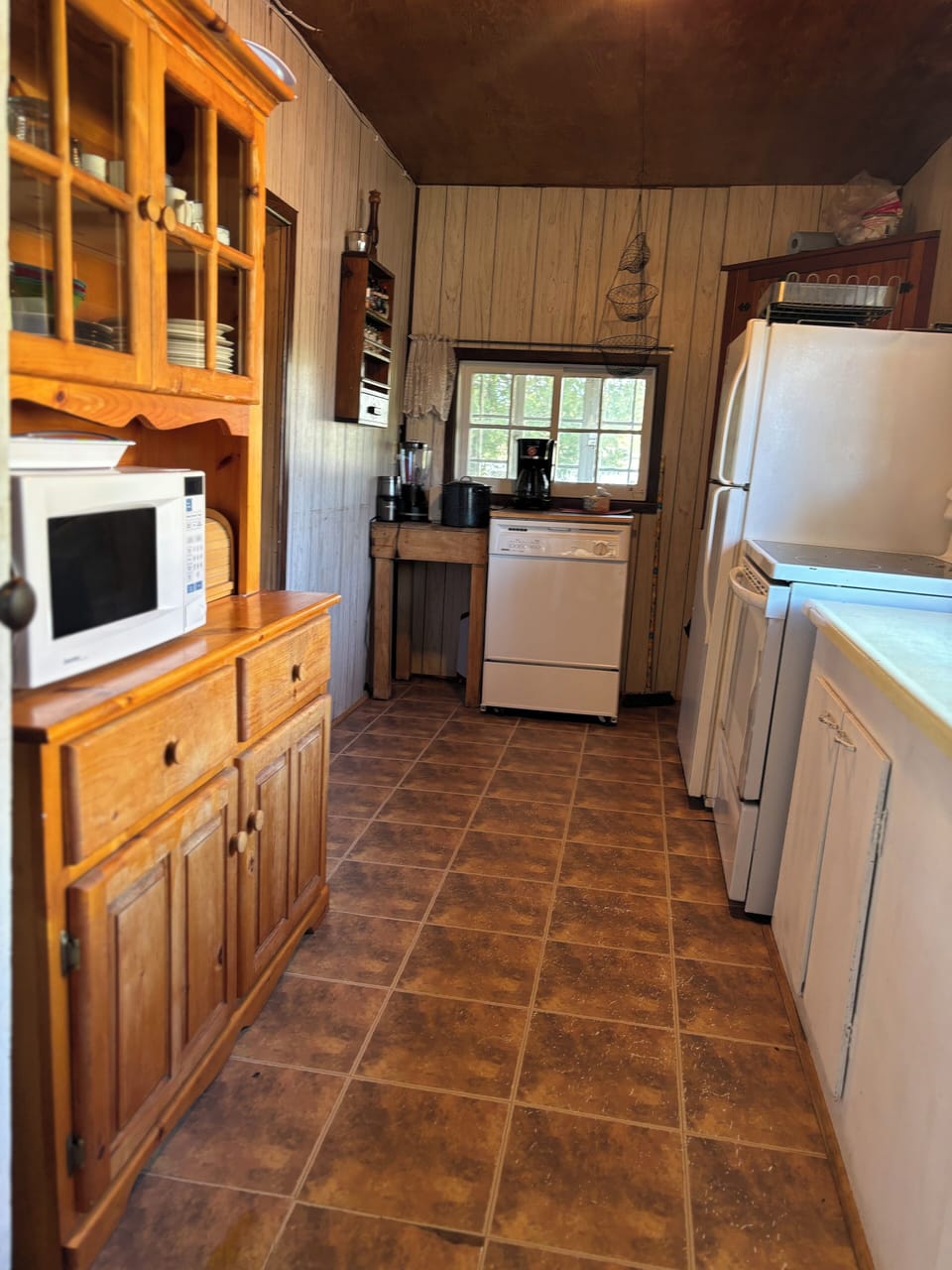 Kitchen equipped with Dishwasher.