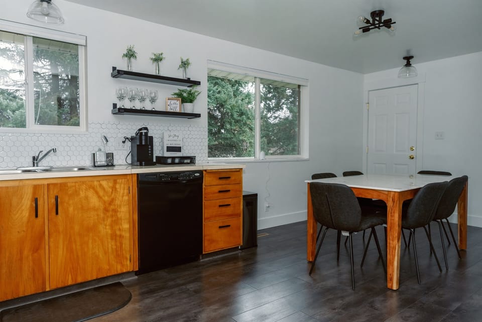 Dining room attached to kitchen. Table seats six.