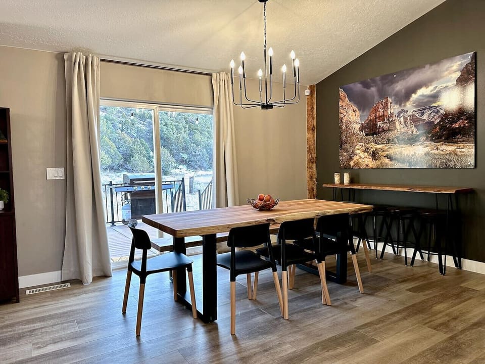 Enjoy your meals at our dining table with natural mountain views.