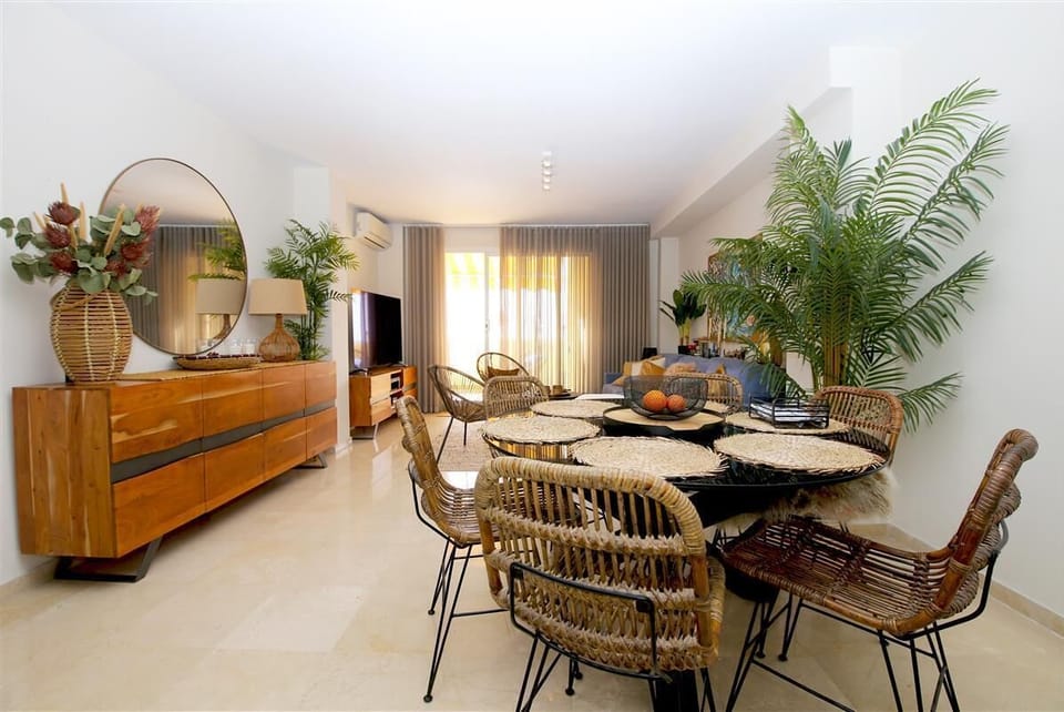 Full view of the lounge and dining area from the open kitchen