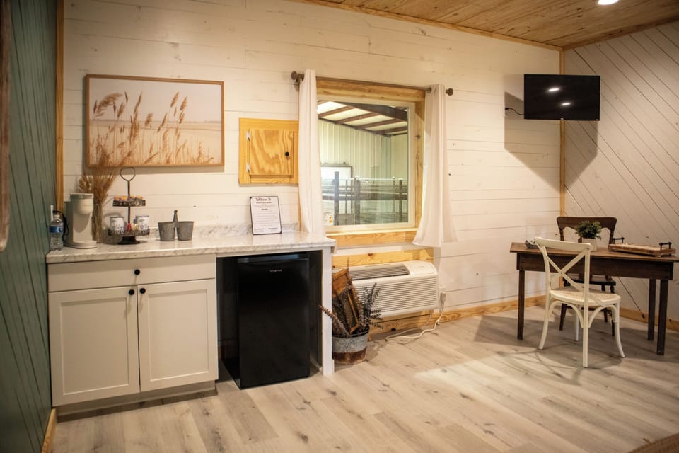 View from your room into the barn suite and space to feed them by window 