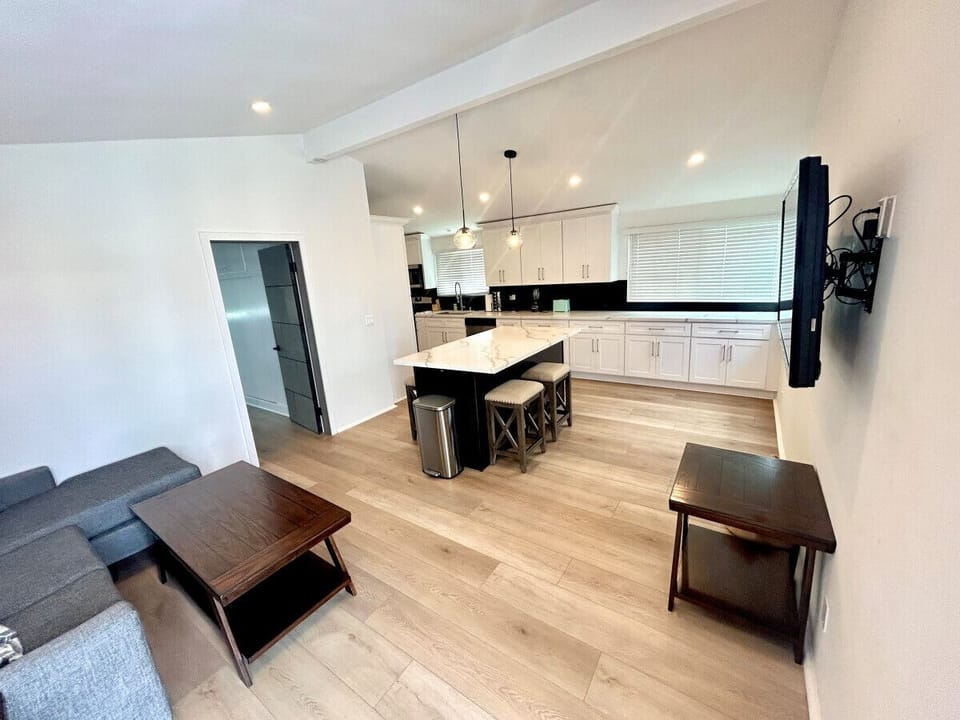 Spacious living area connected to the kitchen.