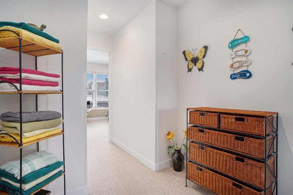 Keep Your SoHa Treasures Close at Hand with the Added Storage Spaces in the Upper Level Hallway