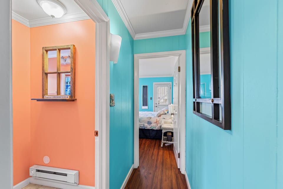 The Hall will lead you to the Full Bath and Bedroom.