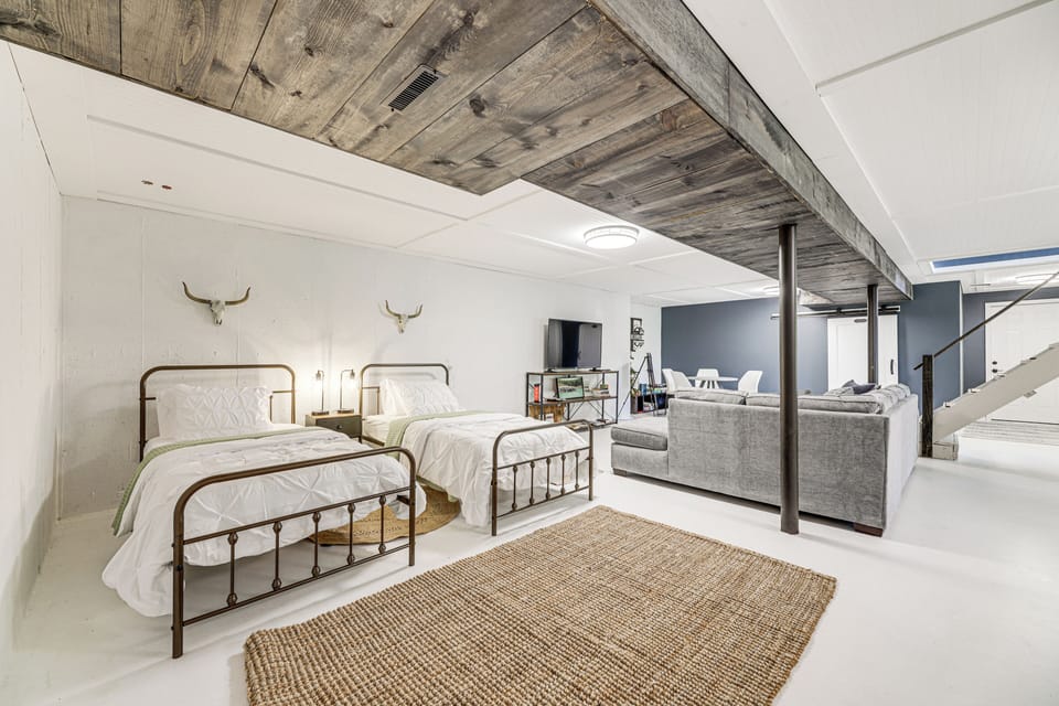 Den | Basement Level | 2 Twin Beds | Smart TV | Board Games