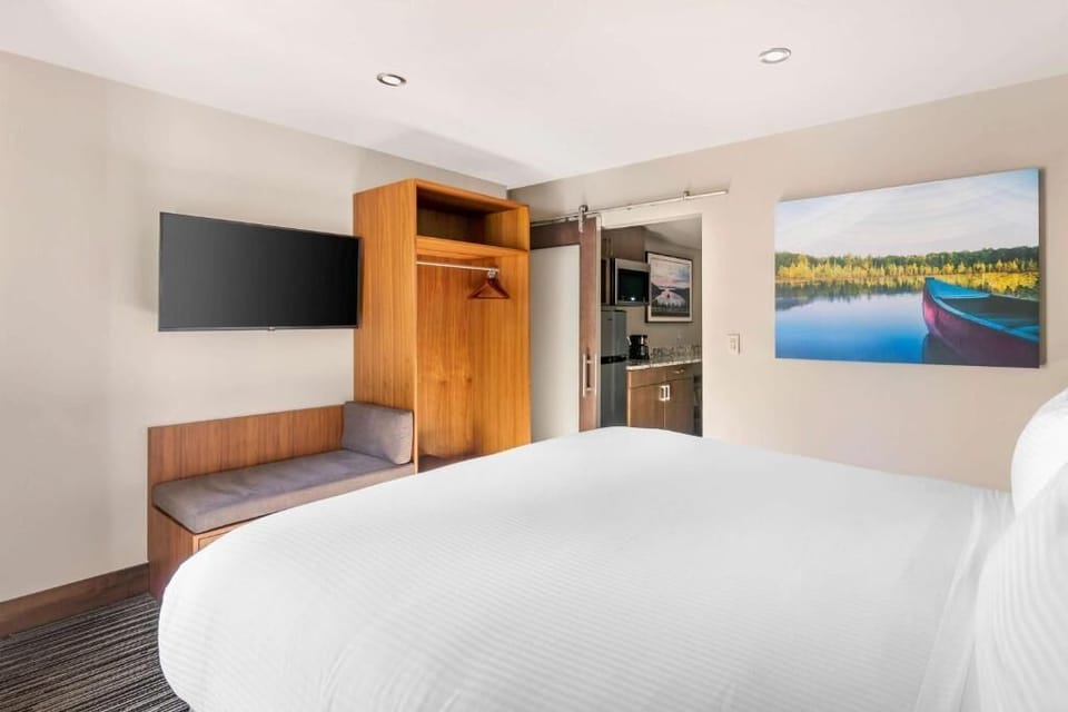 Settle in with easy storage, big TV, and restful comfort.