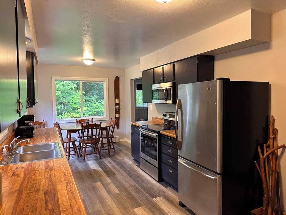Large, fully-stocked kitchen.  