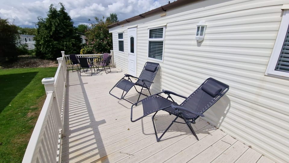 Large decking area to soak in the sunshine at Southview Holiday Park