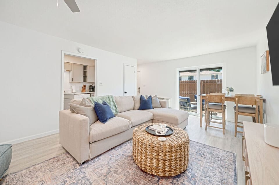 Spacious living room equipped with a television.