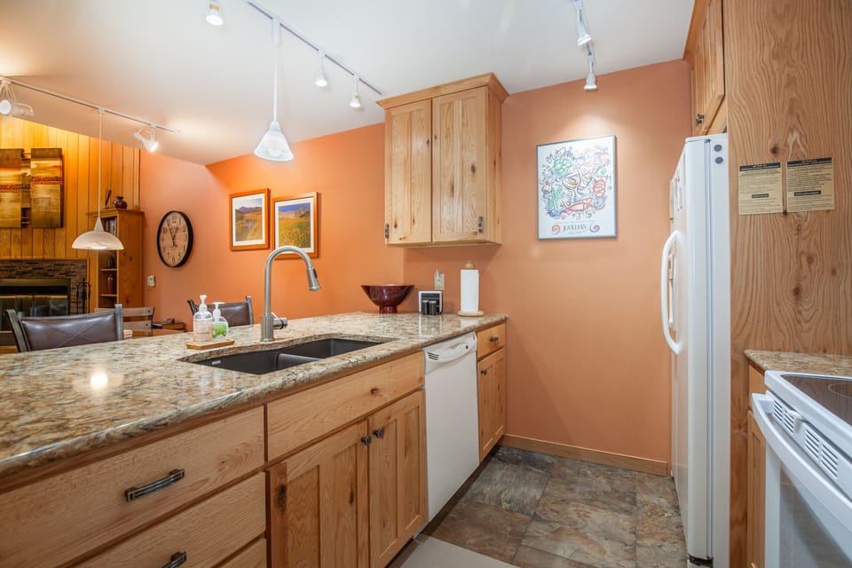 Granite counter tops, stainless steel appliances and all the gadgets you need