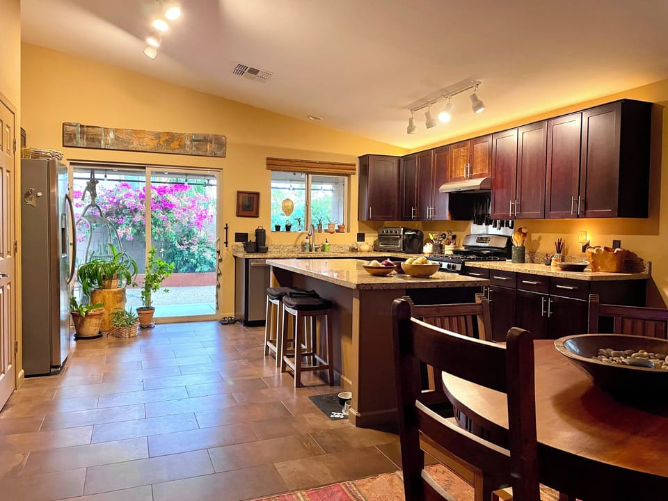 Kitchen and view to garden patio. 