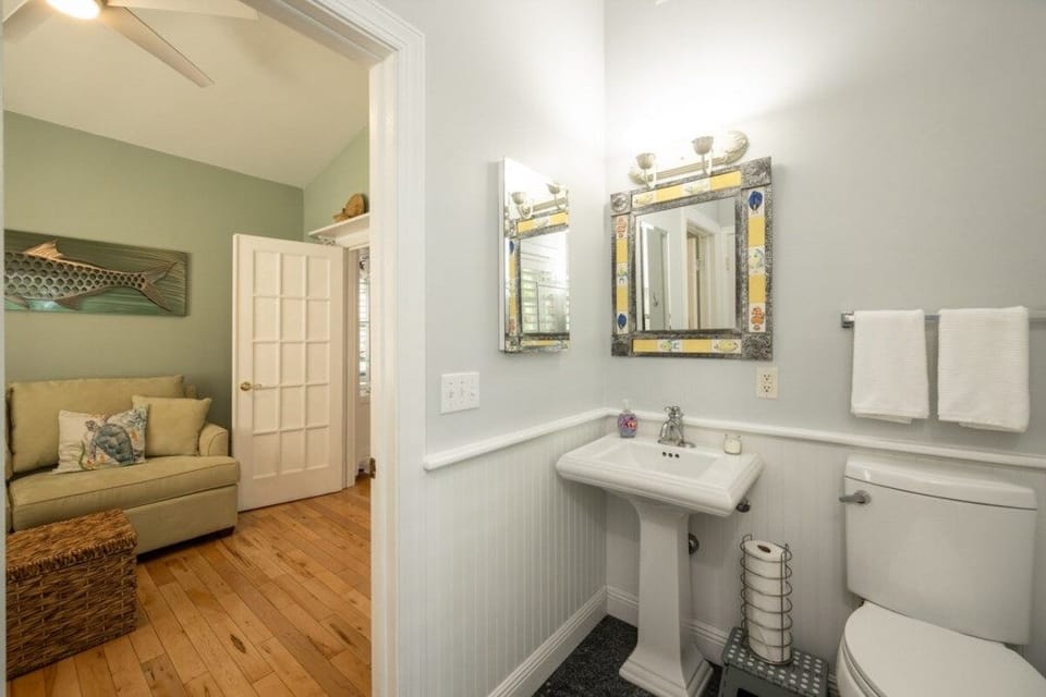 Bath attached to Bedroom #4 has door to the outdoor deck, offering convenient access after swimming in the private pool.