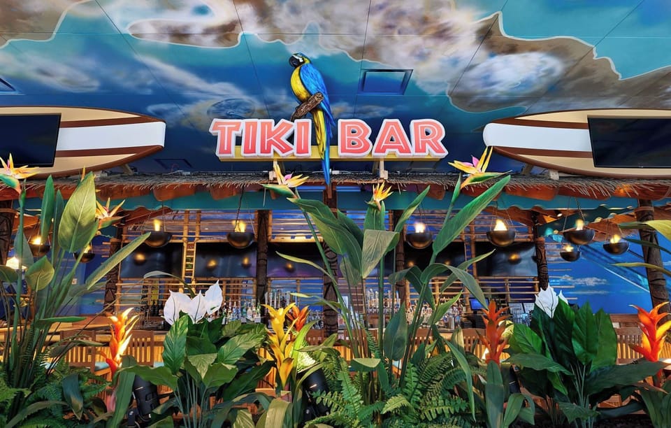 Feel the tiki vibes bloom with lush, colorful tropical decor.
