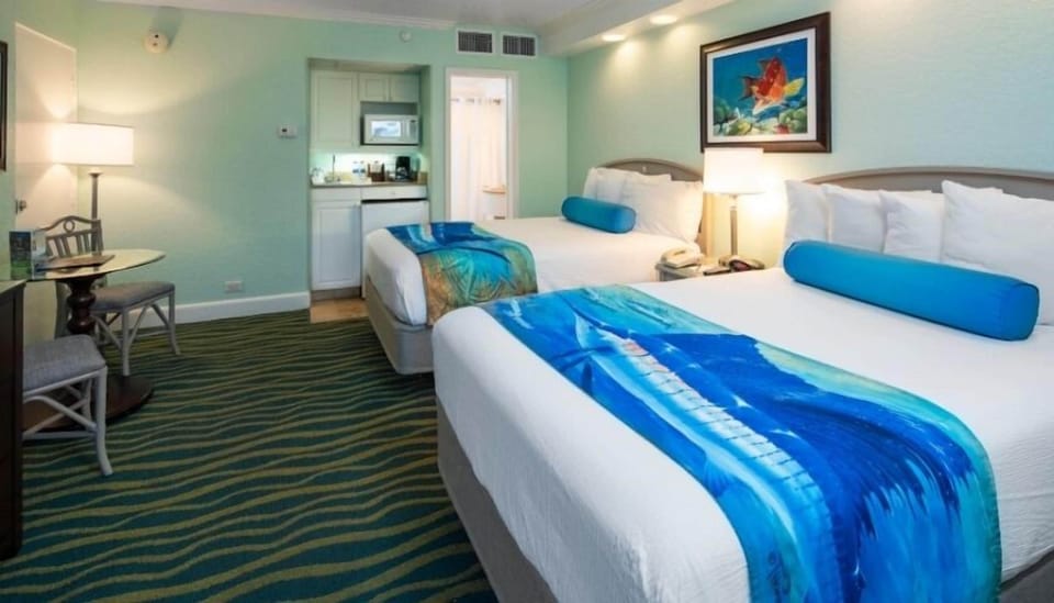 Stretch out on plush beds after a beach-filled day.