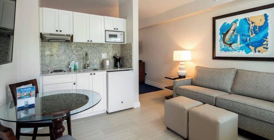 Unwind with snacks and cocktails in your bright kitchenette.