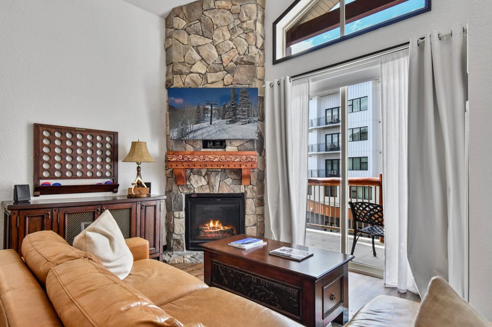 Light-filled living room with sofa sleeper.